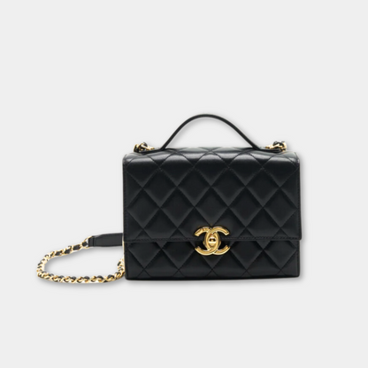 Microchipped Chanel Black 21K Gold Mini Flap Bag