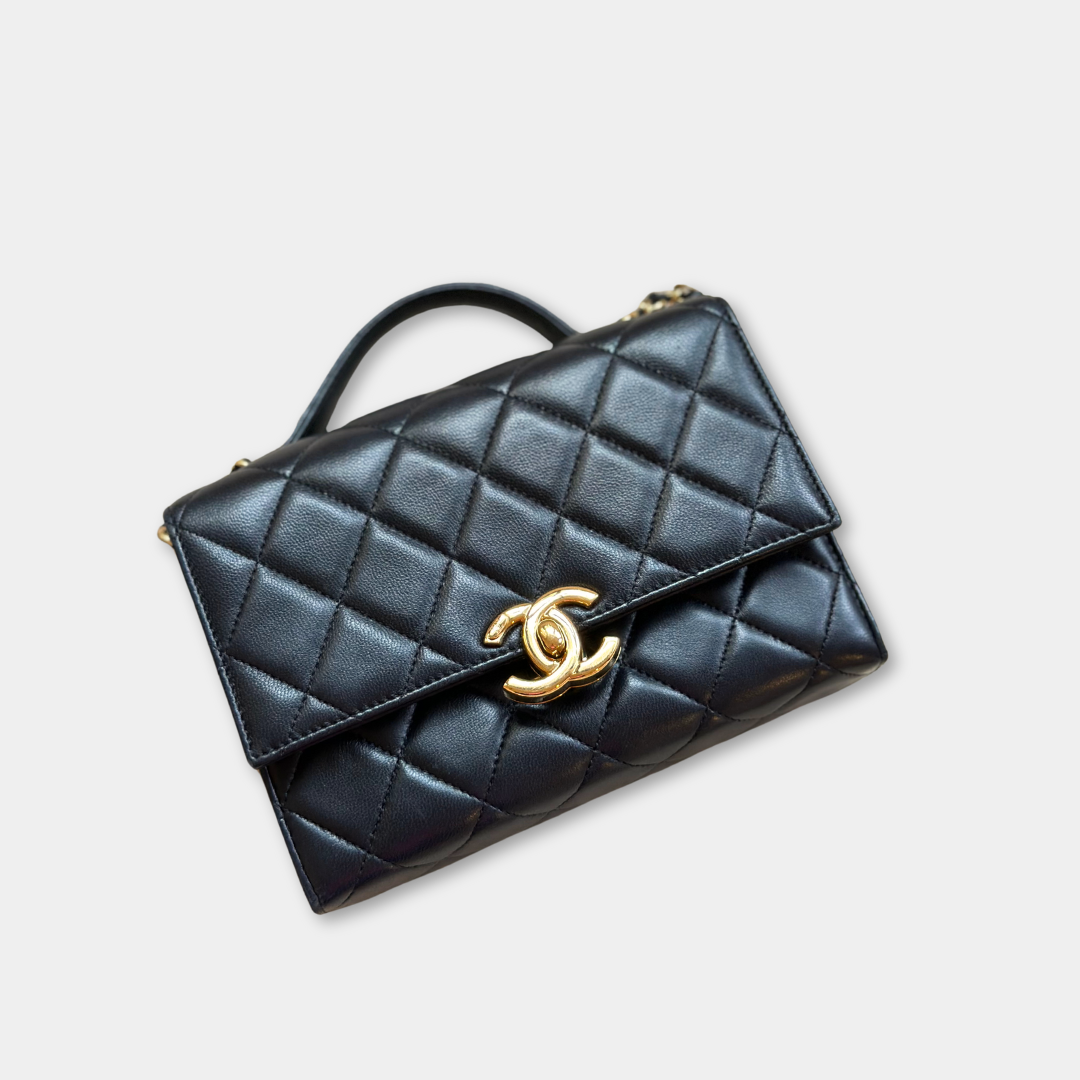 Microchipped Chanel Black 21K Gold Mini Flap Bag