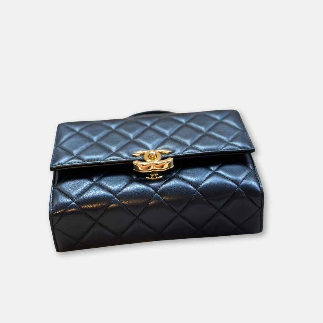 Microchipped Chanel Black 21K Gold Mini Flap Bag