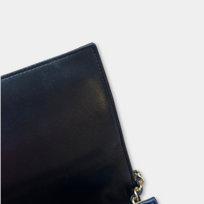 Microchipped Chanel Black 21K Gold Mini Flap Bag