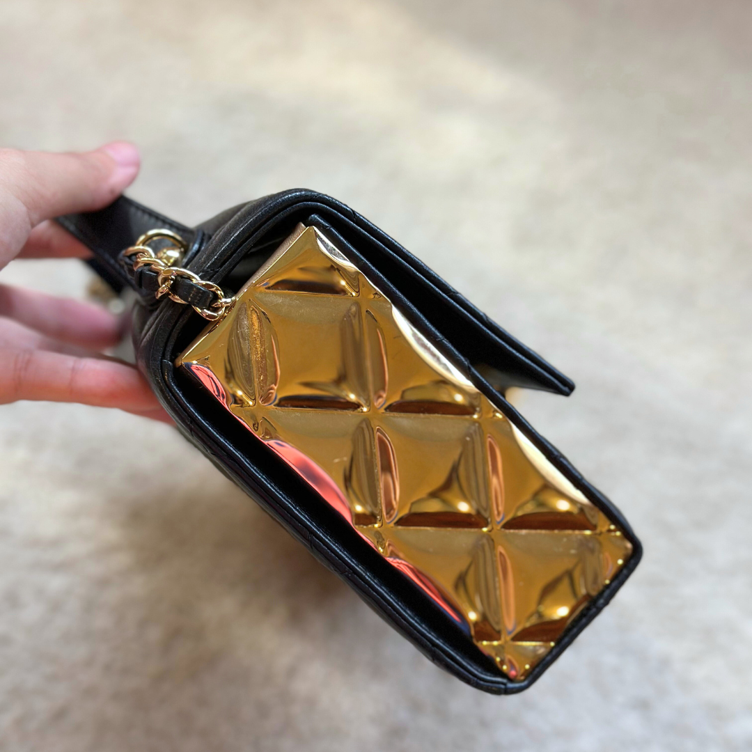 Microchipped Chanel Black 21K Gold Mini Flap Bag